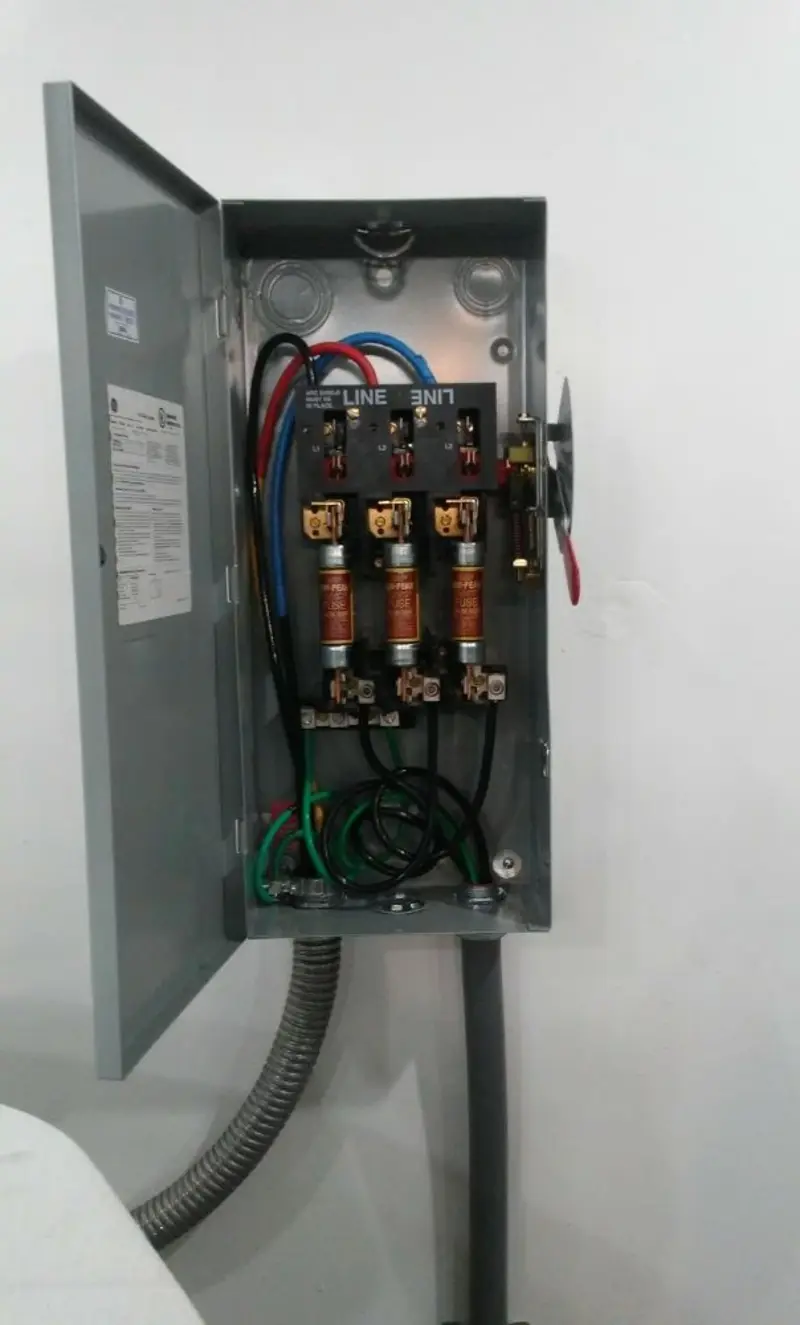 Three-phase disconnect switch installed for Smoke Detector Installation in McCook