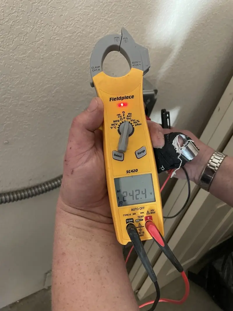 Voltage testing with clamp meter during Circuit Breaker Repair in McCook